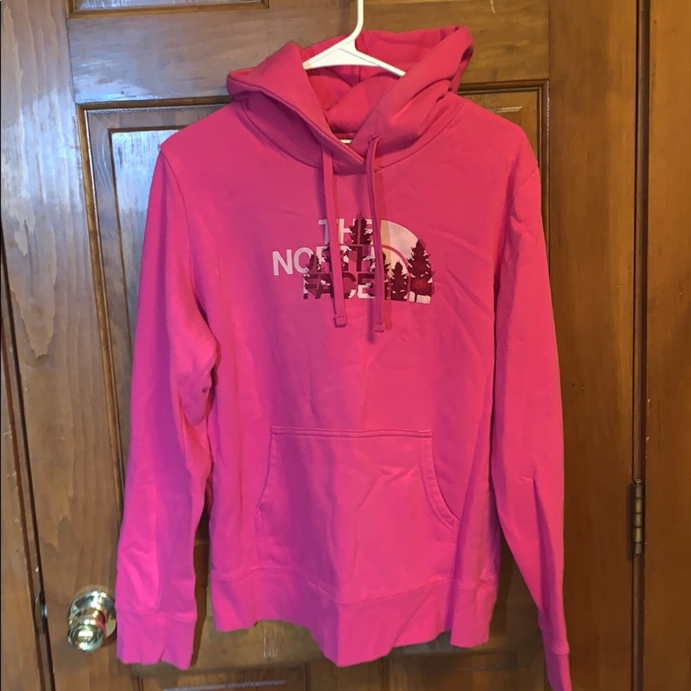 Woman’s pink The North Face Sweatshirt